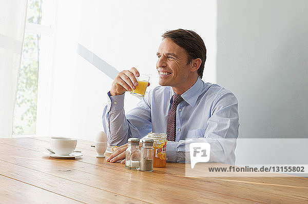 man at breakfast table
