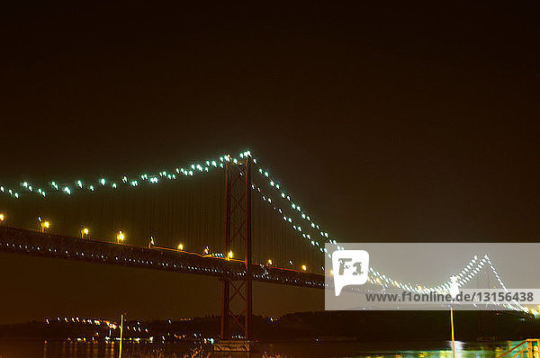Urban bridge lit up at night