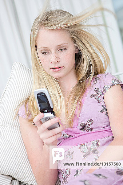 Teenage Girl using mobile phone