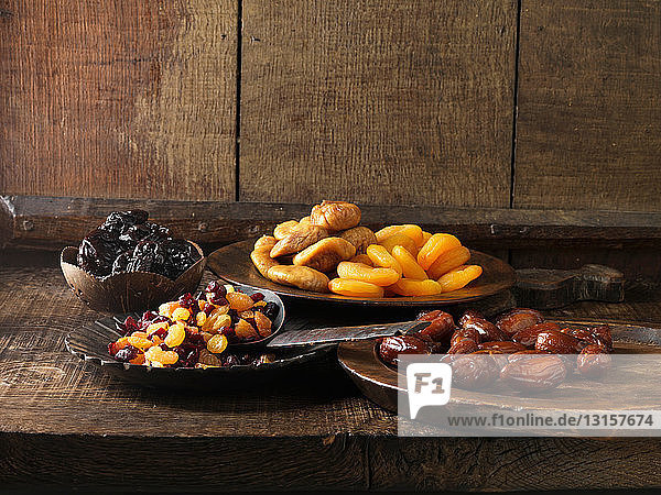 Dried fruits on assorted serving plates