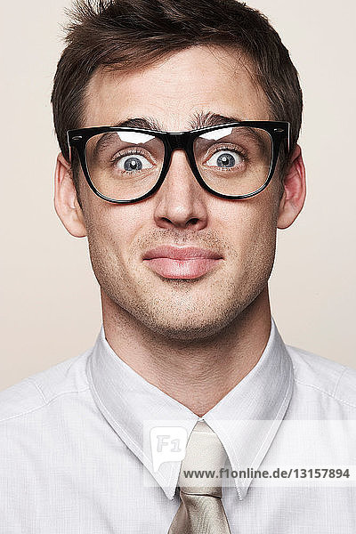 Young man wearing retro glasses