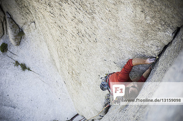 'Man climbing ''Bongeater'' 5.10d - Little Cottonwood Canyon  Salt Lake City  Utah  USA'
