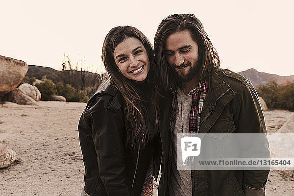 Portrait of young couple in desert  Los Angeles  California  USA