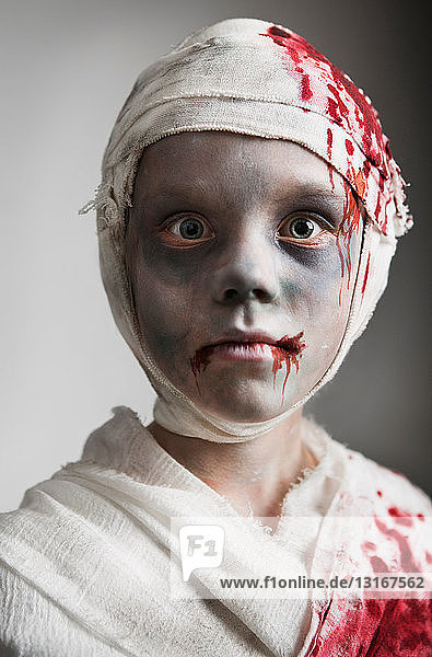 Child dressed as mummy for Halloween