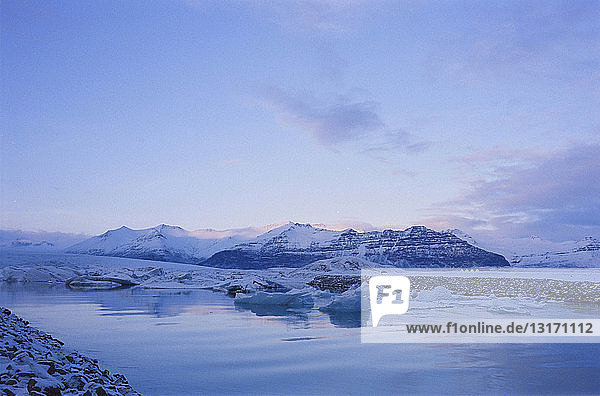 View of icebergs in coastal water Sudhurland Iceland