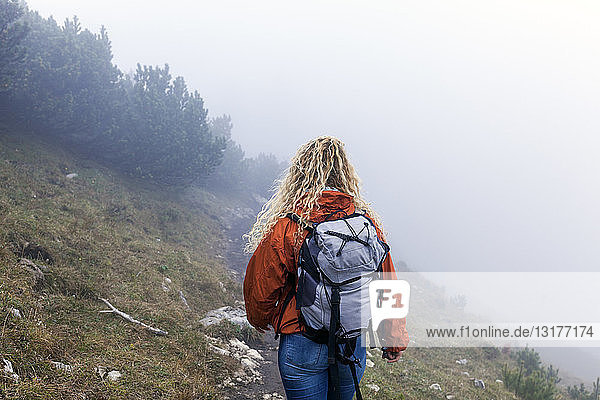 Young woman hiking in the Bavarian mountains