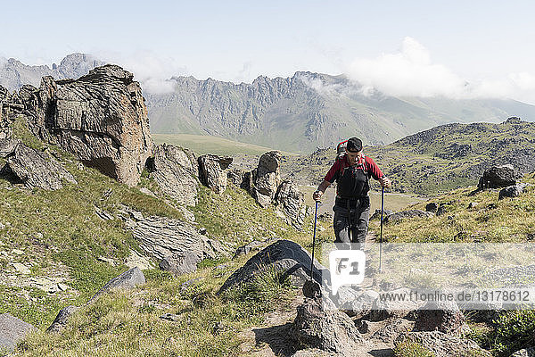 Russia  Caucasus  Mountaineer hiking in Upper Baksan Valley