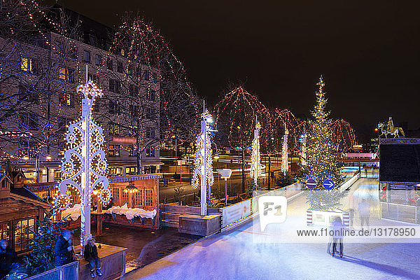 Germany  Cologne  view to Christmas market with ice rink at Heumarkt