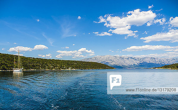Croatia Damlatia Brac Island Povlja bay of Pucisca with sailing ship