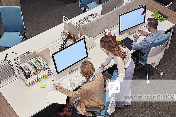 People working in big modern office
