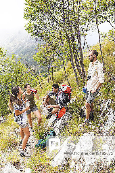 Italy  Massa  hikers taking a rest during a day in the Alpi Apuane mountains