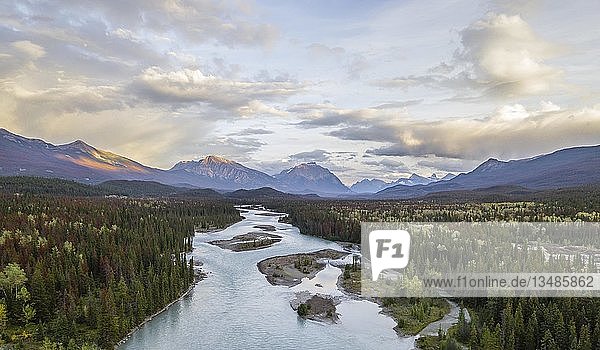 View of a valley with river  Icefields Parkway  Athabasca River  Jasper National Park  mountains behind  evening mood  Alberta  Canada  North America