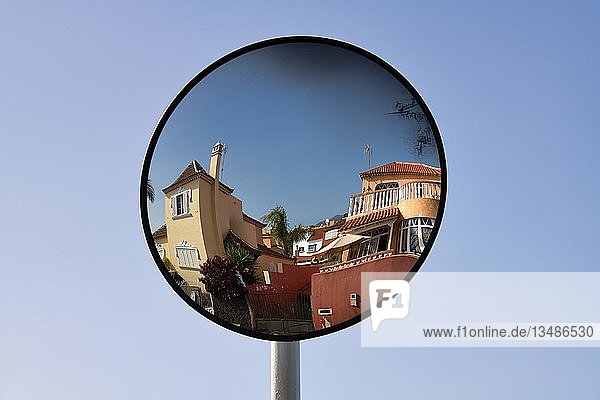 Colorful houses reflected in traffic mirror  El Sauzal  Tenerife  Canary Islands  Spain  Europe