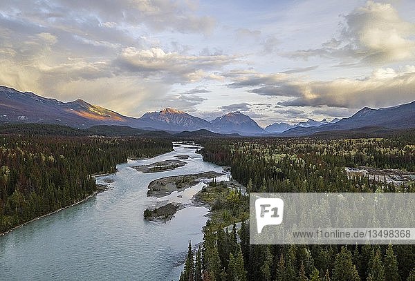 View of a valley with river  Icefields Parkway  Athabasca River  Jasper National Park  mountains behind  evening mood  Alberta  Canada  North America
