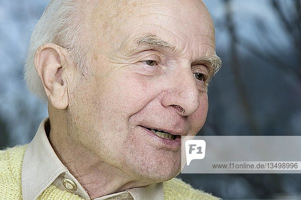 Elderly man having a conversation  smiling  Germany  Europe