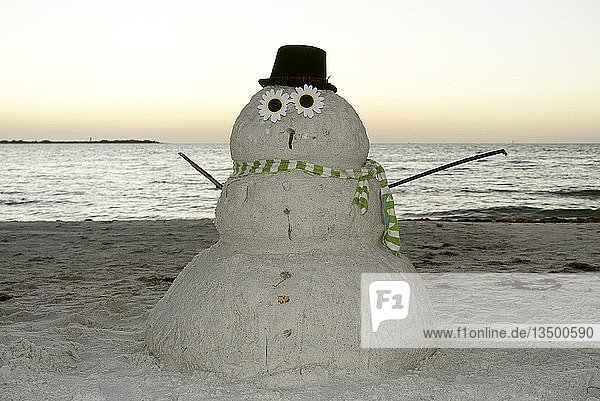 Snowman made of sand on the beach in the evening light  Fort De Soto Park  Florida  USA  North America