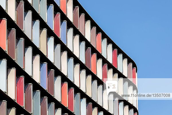 Colourful exterior facade of an office building in the financial district  London  Great Britain