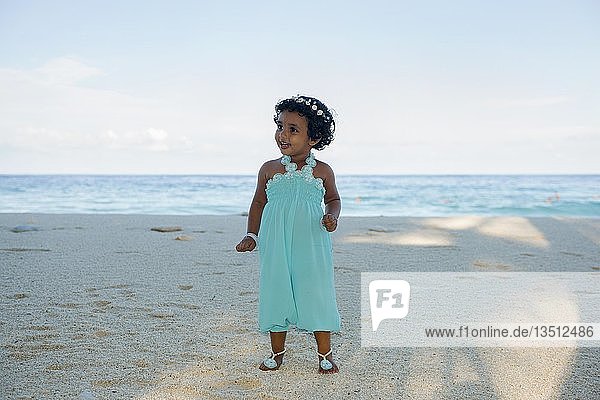 Little Maldivian girl on the sandy beach  Fuvahmulah Island  Maldives  Asia