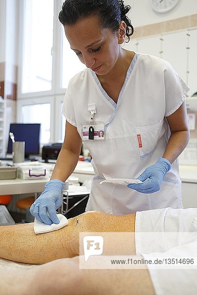 Nurse treats the knee  surgery department  health service  Czech Republic  Europe
