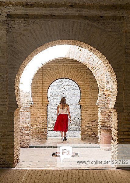 Woman with red dress  Arab baths  Alcázar de Jerez  Jerez de la Frontera  Cádiz province  Andalusia  Spain  Europe