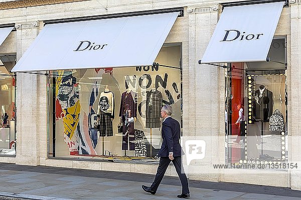 Passer-by in front of shop window  fashion shop Dior  London  United Kingdom  Europe