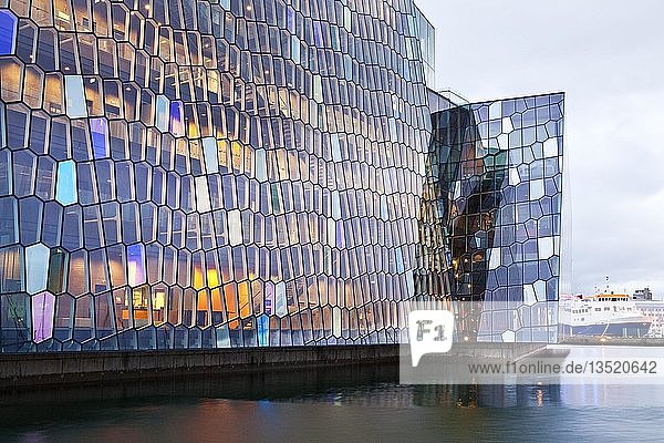 Facade of the honeycomb structure made of dichromatic glass by Olafur Eliasson at the Harpa Concert Hall  Reykjavik  Iceland  Europe