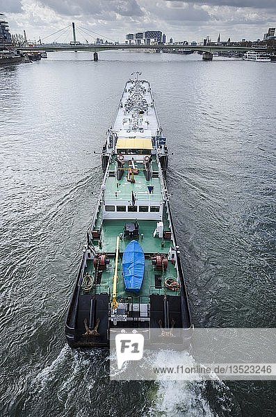 A transport ship travelling on the Rhine River near Cologne  North Rhine-Westphalia  Germany  Europe
