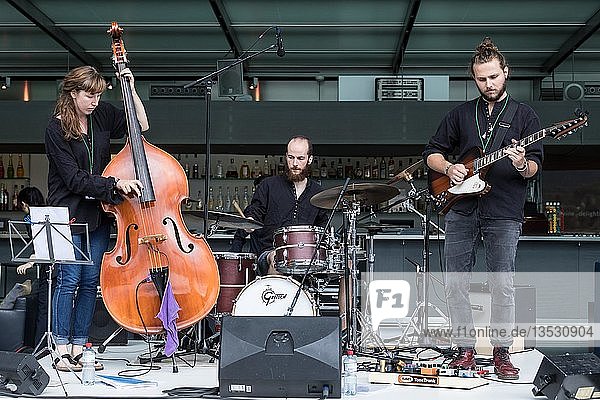 The Swiss music trio Forlorn Elm with David Friedli at the Gitrarre  Johanna Pärli on bass and Luca Weber on drums  live at the 25th Blue Balls Festival in Lucerne  Switzerland  Europe