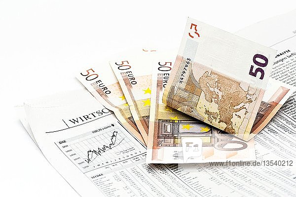 Börsennotierung in einer Zeitung und Euro-Scheine