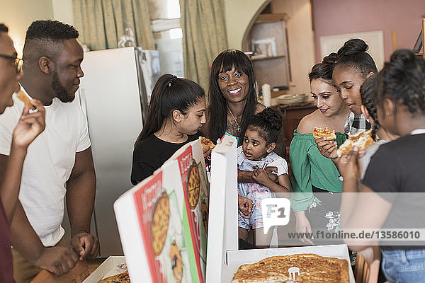 Family enjoying pizza