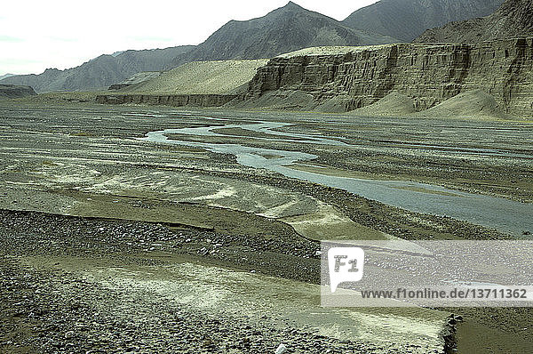 Braided river channel and alluvial terraces on the Golmud River in the Kunlun Mountains,  Qinghai Province,  China.