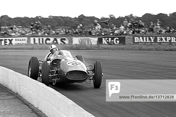 Roy Salvadori in a works Aston Martin DBR4 in the British Grand Prix at Silverstone  England 16th July 1960.