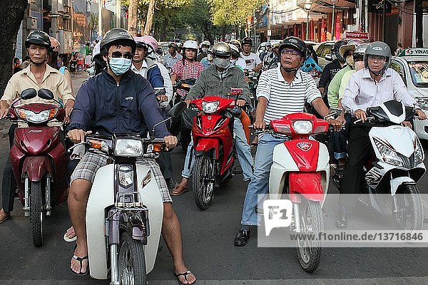 Rush Hour Moped Commuters Crowding Street  Vietnam