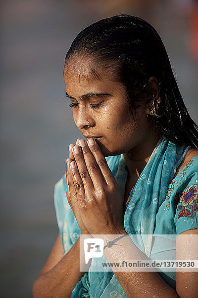 Pilgrim at the Kumbh Mela in Haridwar  February 2010  praying in the Ganga.