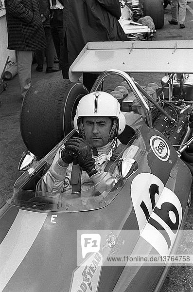 'Wearing USAF-style helicopter pilot´s helmet Jack Brabham in a Brabham-Cosworth BT33. Race of Champions  Brands Hatch  England 22 March 1970. '