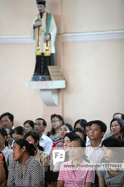 Catholic mass in a vietnamese church.