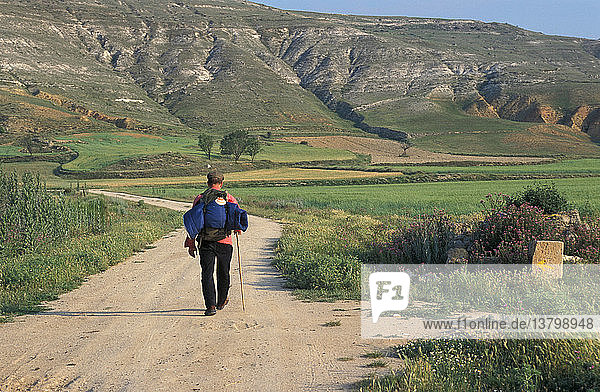 Pilgrim walking on the Santiago of Compostela path
