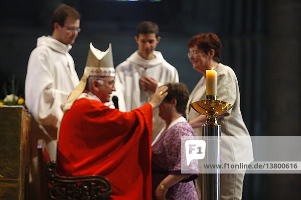Adult confirmation in Reims cathedral