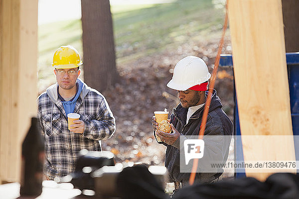 Carpenters on coffee break at a construction site