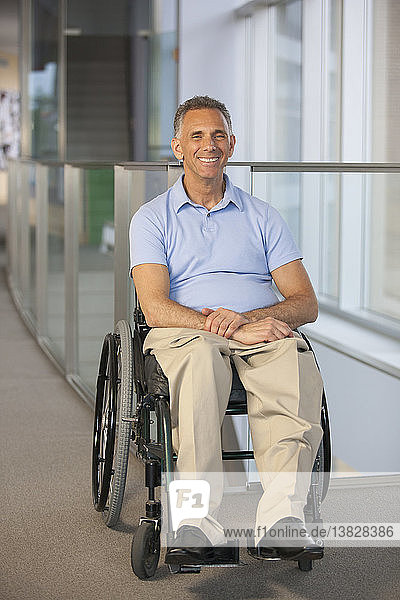 Man in wheelchair with spinal cord injury
