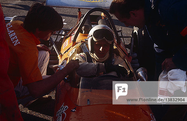 Bruce McLaren close-up in McLaren car. 1970 SA GP.