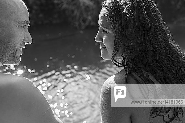 Couple at sunny riverside