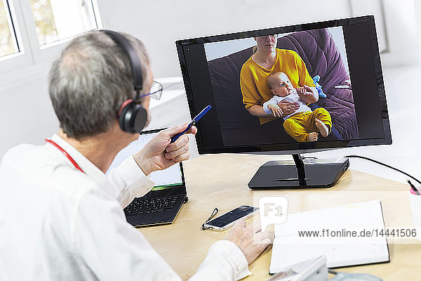 Pediatric video consultation for a child with an upset stomach.
