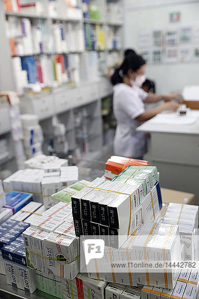 Hospital pharmacy. Pharmacist checking inventory. Tam Duc Cardiology Hospital.. Ho Chi Minh City. Vietnam.