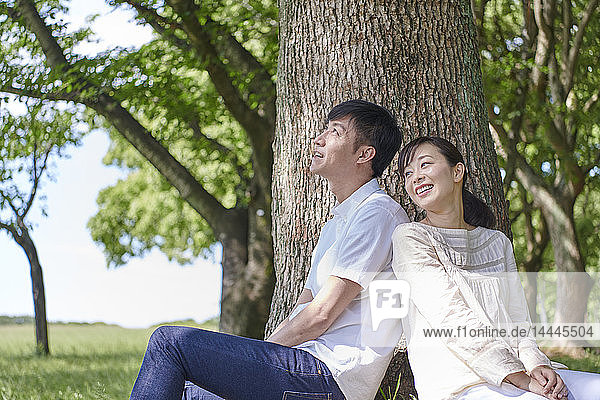 Japanese couple in a city park