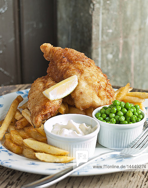 Fish and chips  peas and mayonaise