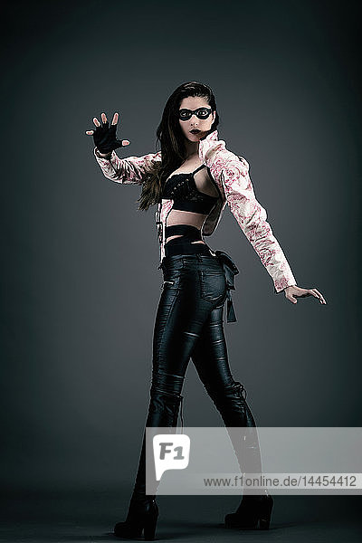 Young woman dressed as superhero