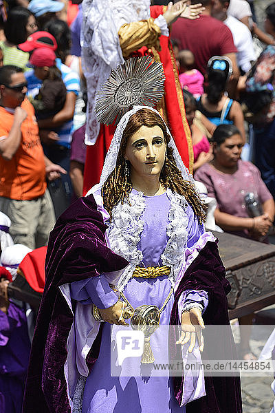 Penitents carry the image of the Holy Virgin of Sorrow (Santisima Virgen of Sorrow (Santissima Virgen de Dolores) at the Jesus Nazareno del Perdon procession during Holy week  Antigua  Guatemala  Central America.
