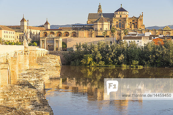 The Mosque-Cathedral (Great Mosque of Cordoba) (Mezquita) and Roman Bridge  UNESCO World Heritage Site  at first sunlight  Cordoba  Andalusia  Spain
