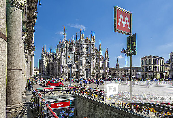 View of Duomo di Milano and Metro entrance in Piazza Del Duomo on a sunny day  Milan  Lombardy  Italy